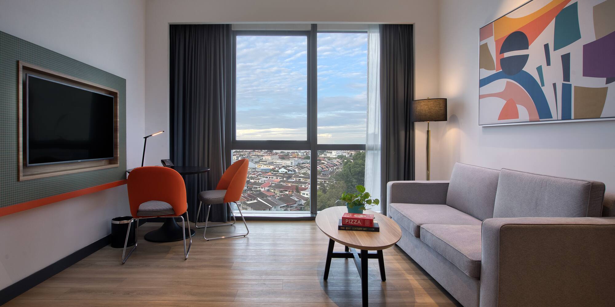 a living room with a couch and a table