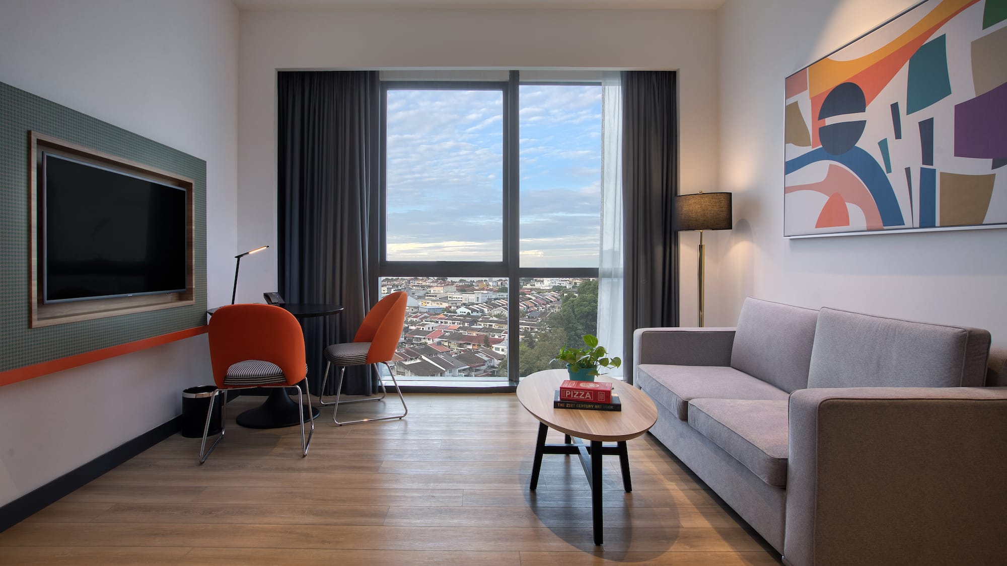 a living room with a couch and a table