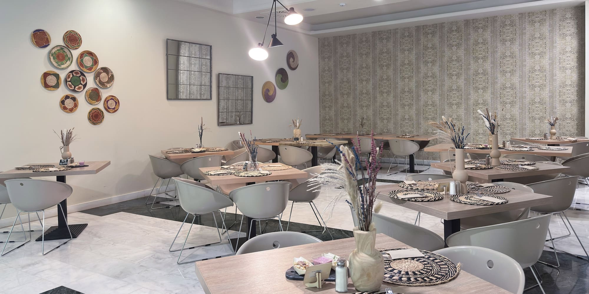 a room with tables and chairs