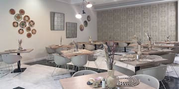 a room with tables and chairs