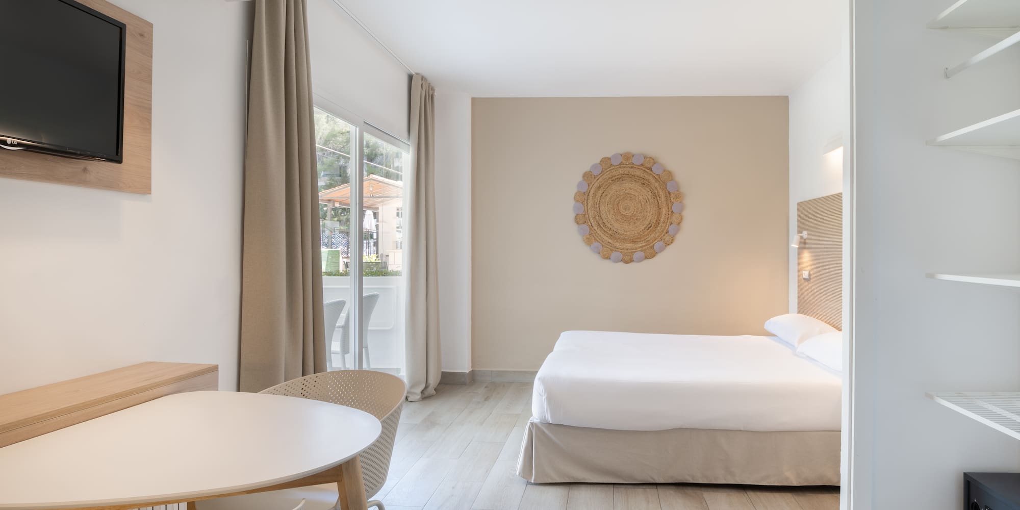 a room with a bed and a table