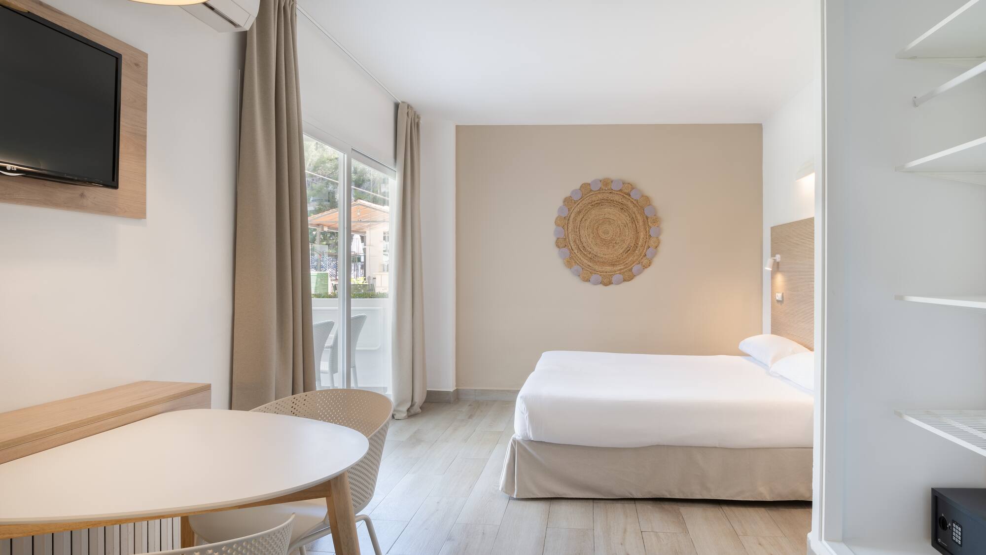 a room with a bed and a table