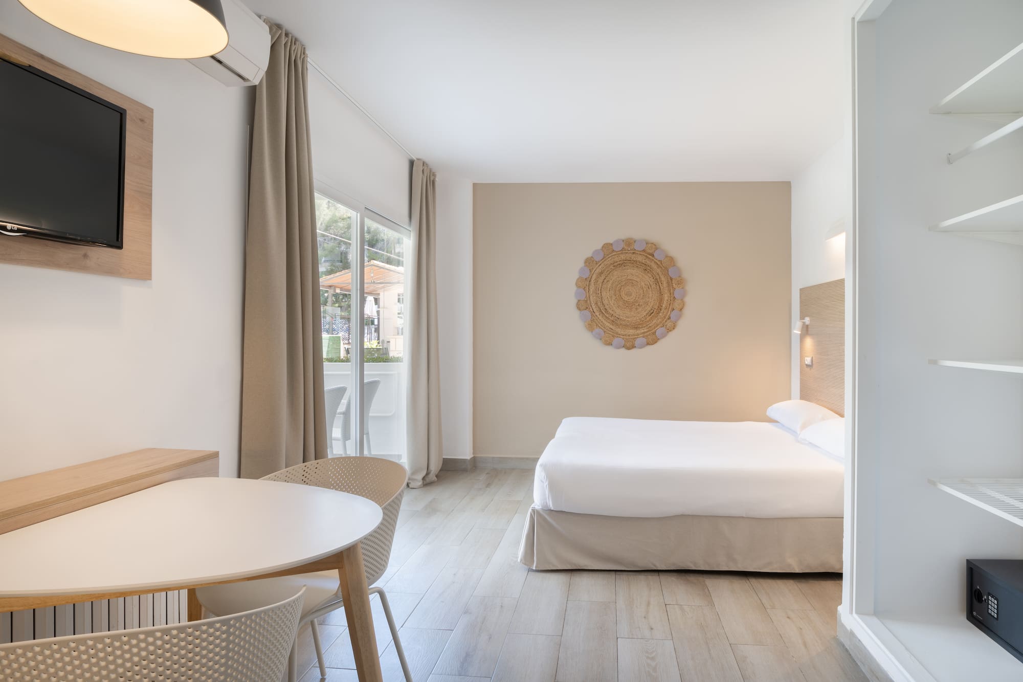 a room with a bed and a table