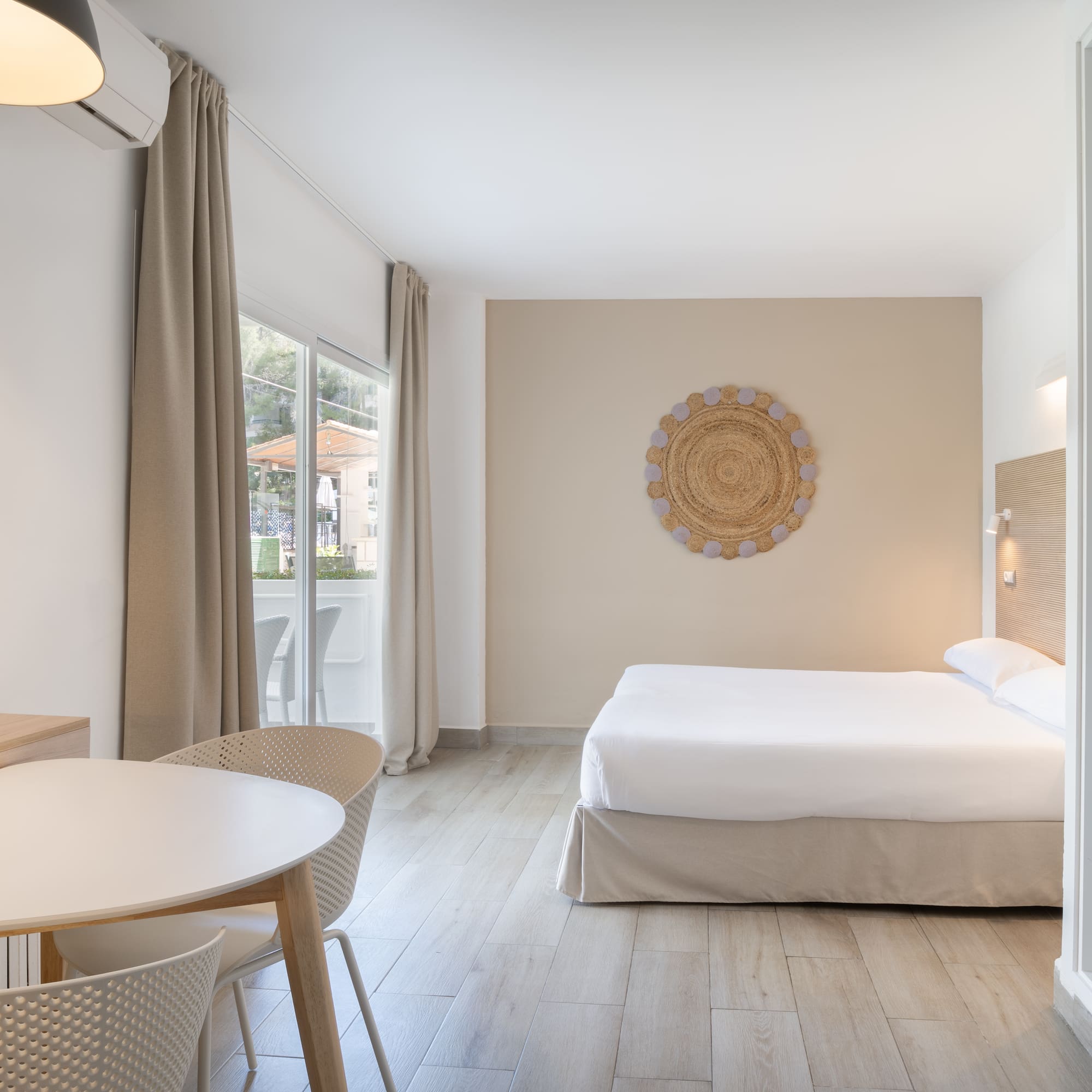 a room with a bed and a table