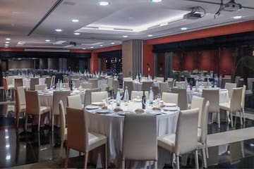 a room with tables and chairs