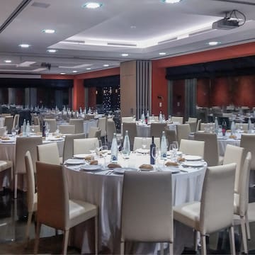 a room with tables and chairs