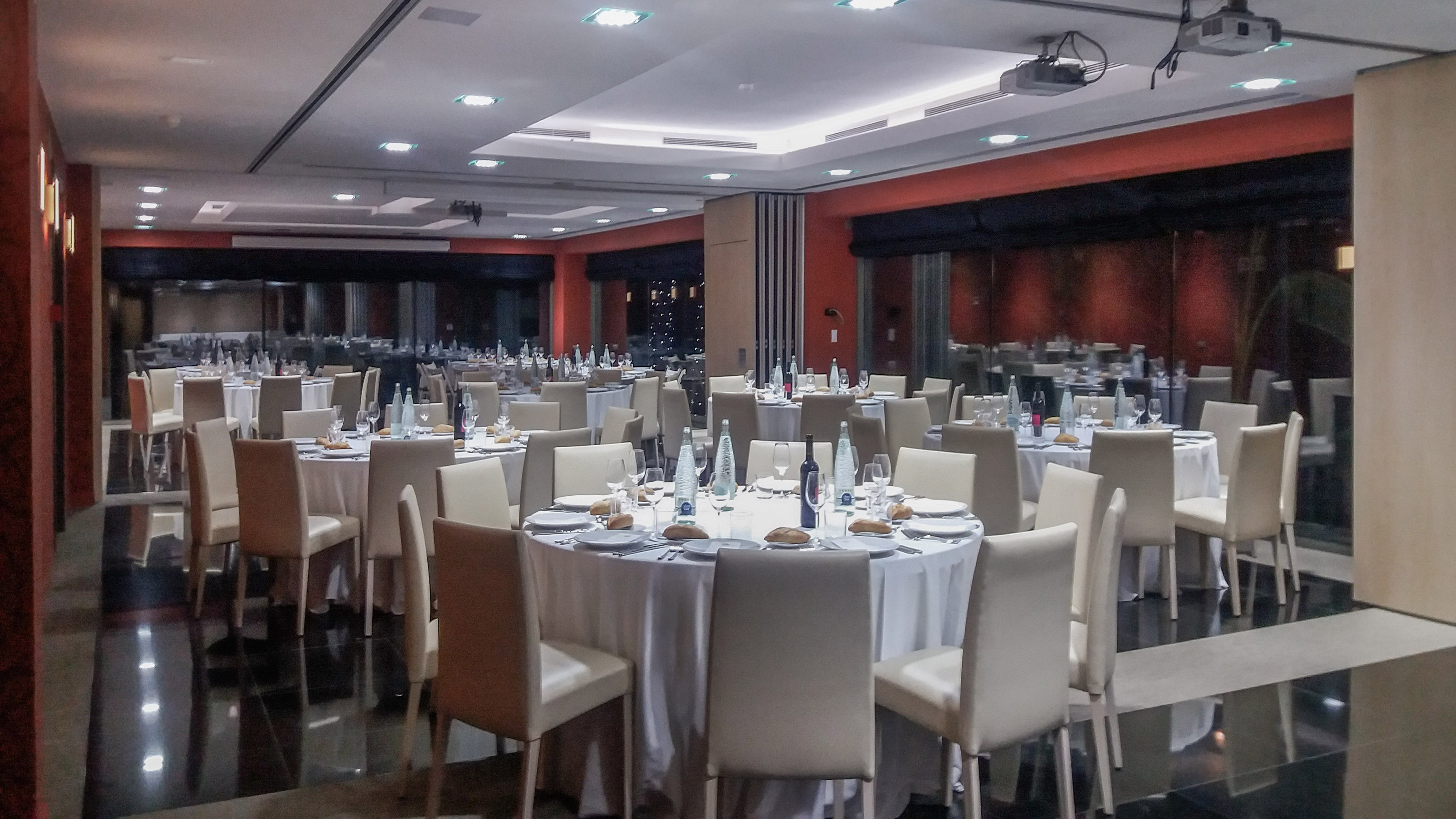 a room with tables and chairs