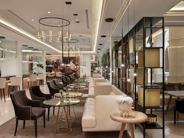 a room with tables and chairs