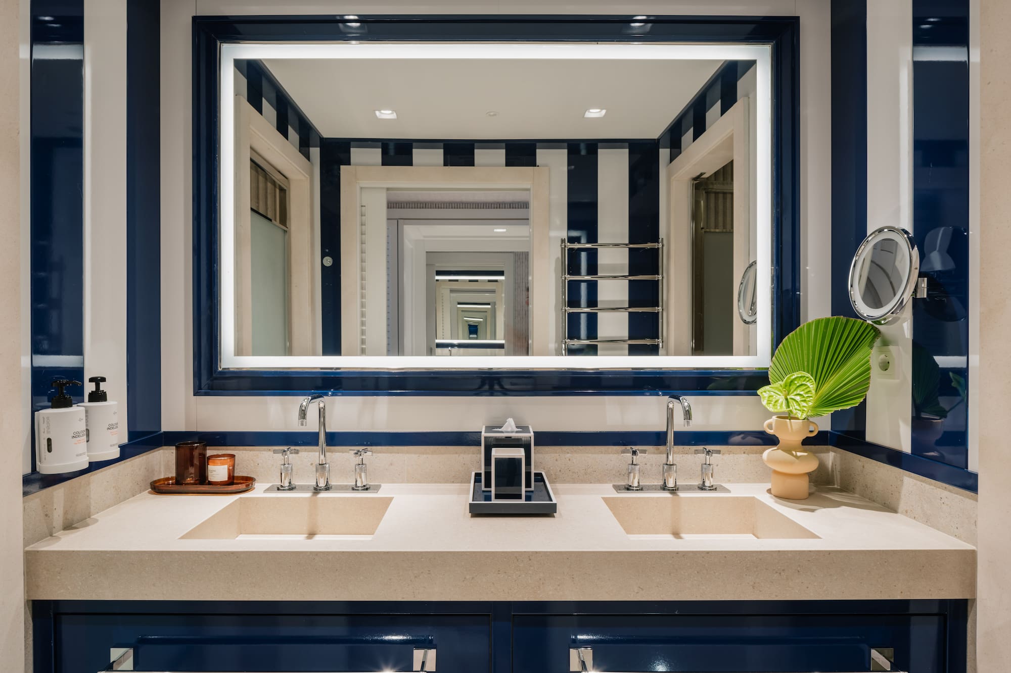 a bathroom with a mirror and sinks