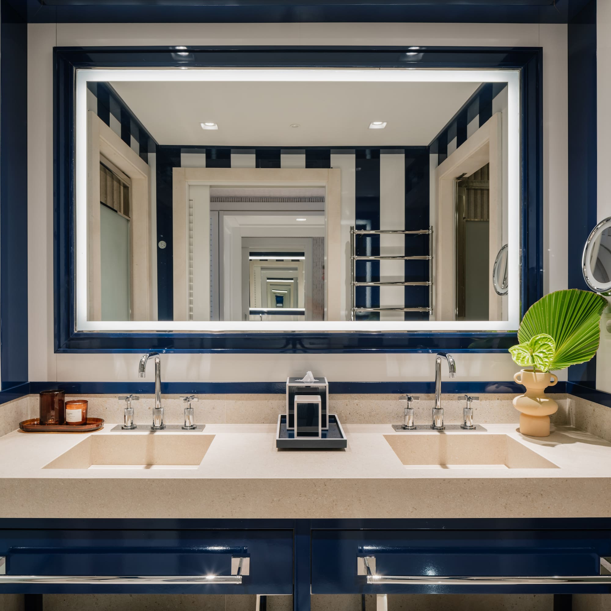 a bathroom with a mirror and sinks