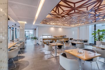 a room with tables and chairs