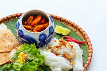 a plate of food on a white surface