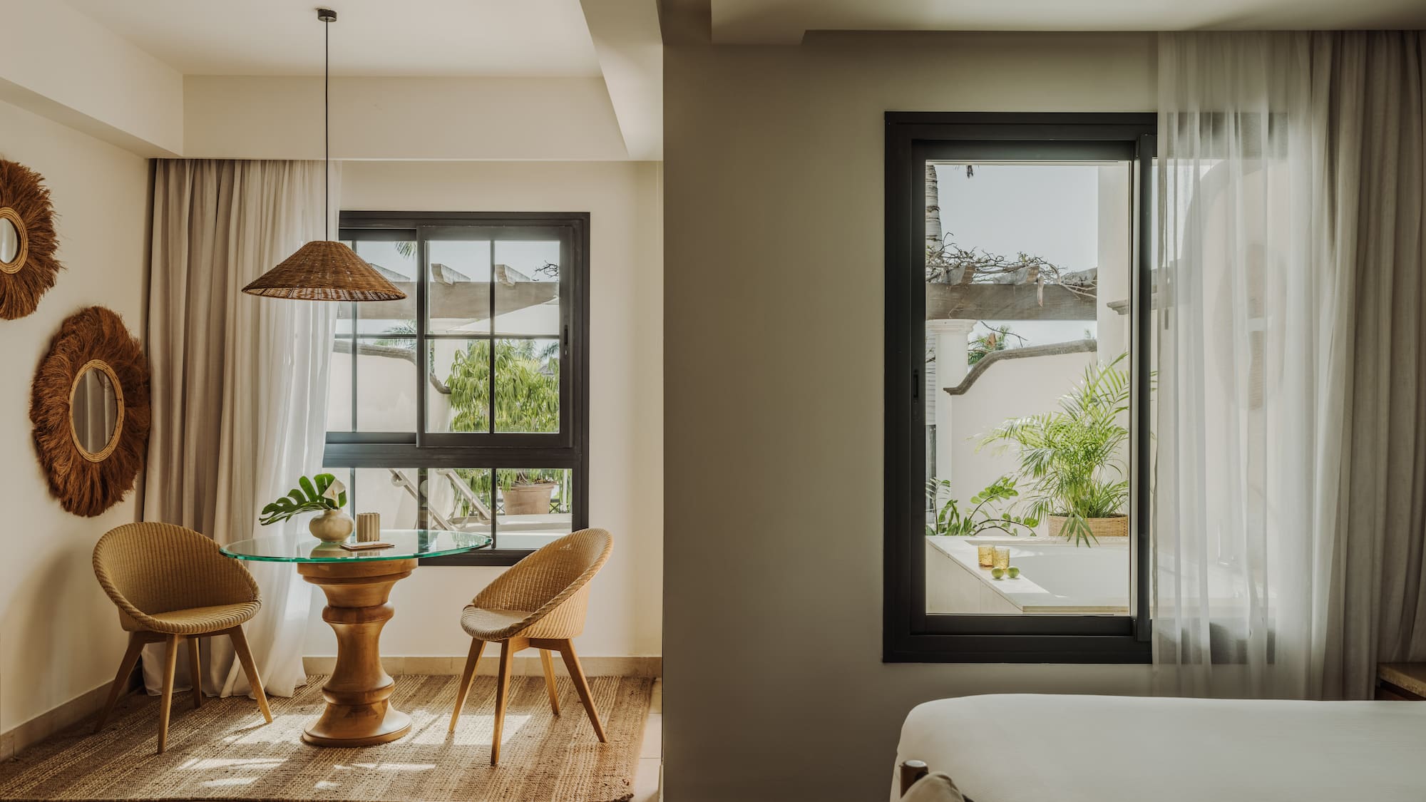 a room with a table and chairs