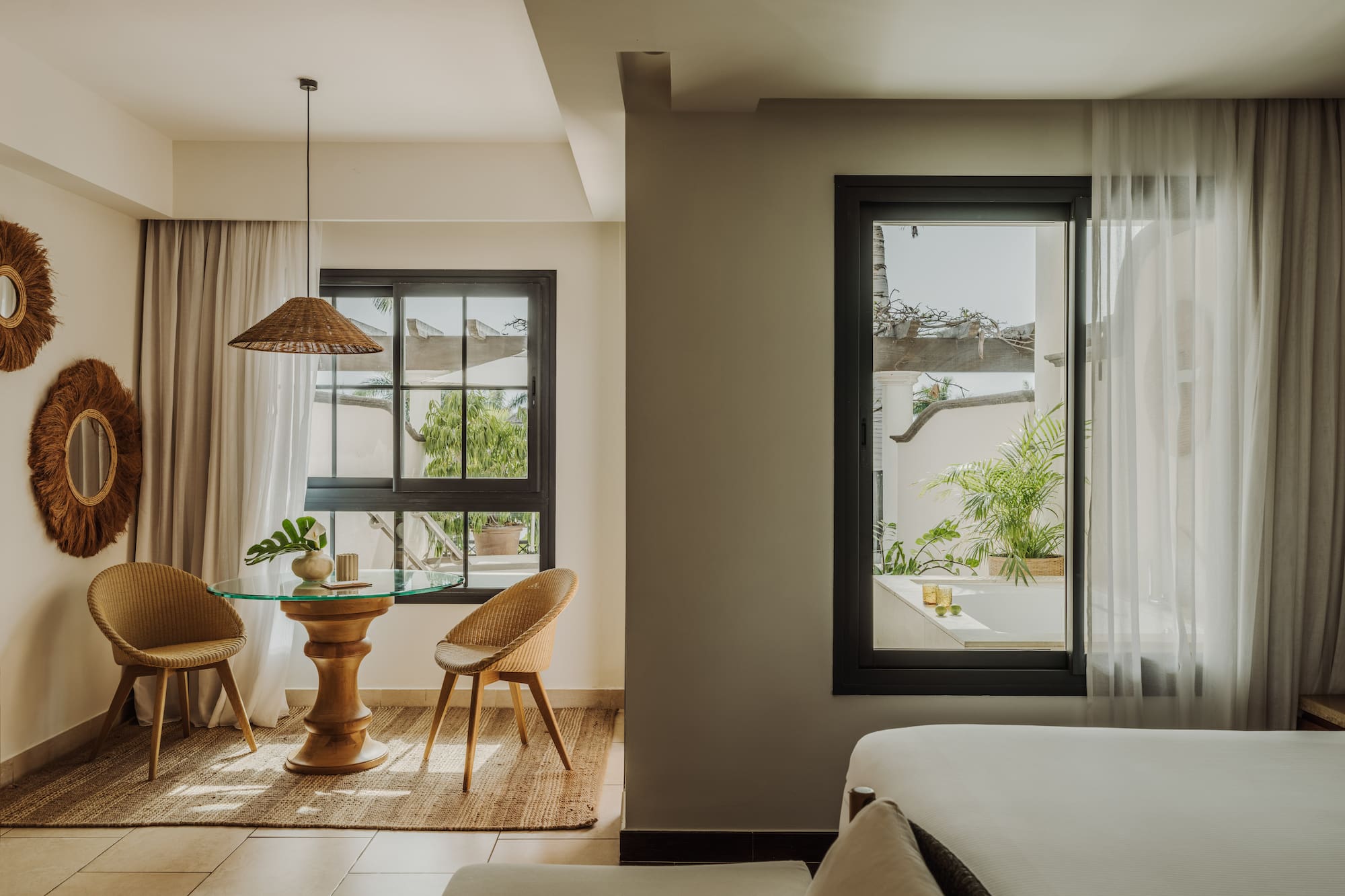 a room with a table and chairs