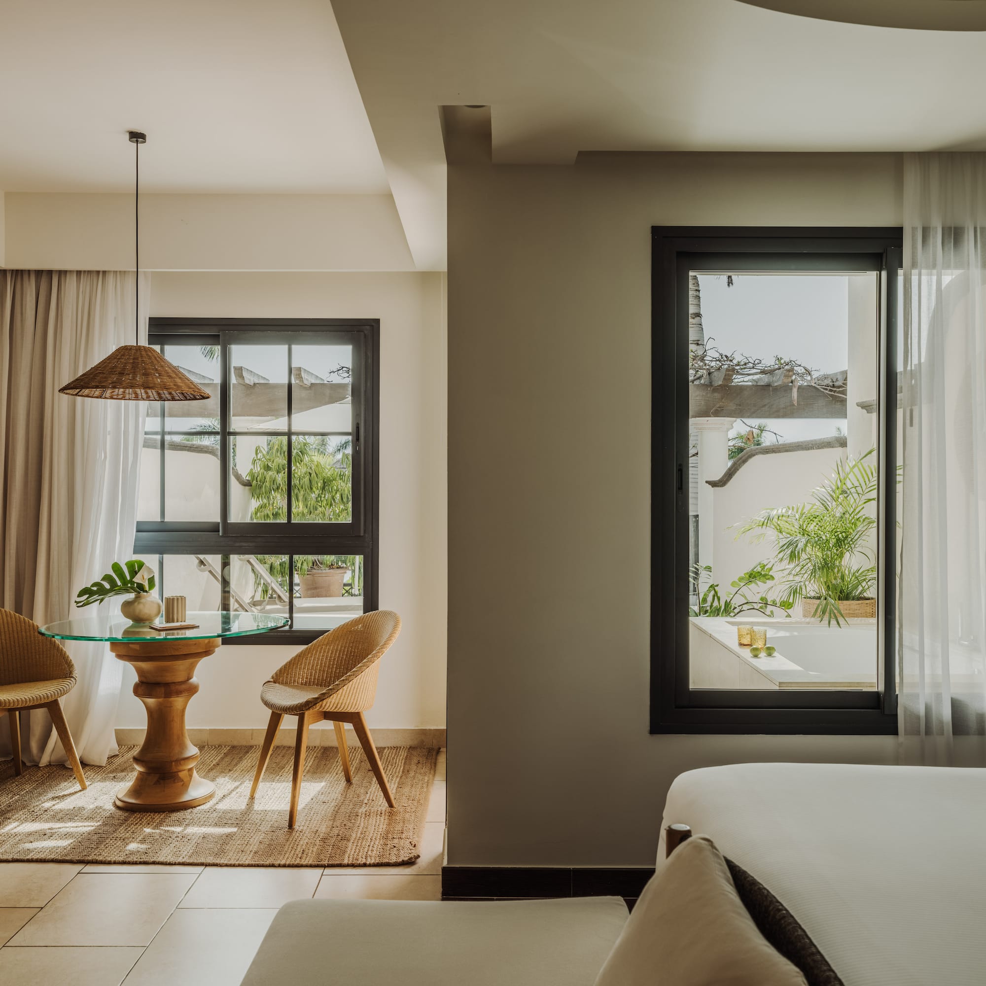 a room with a table and chairs