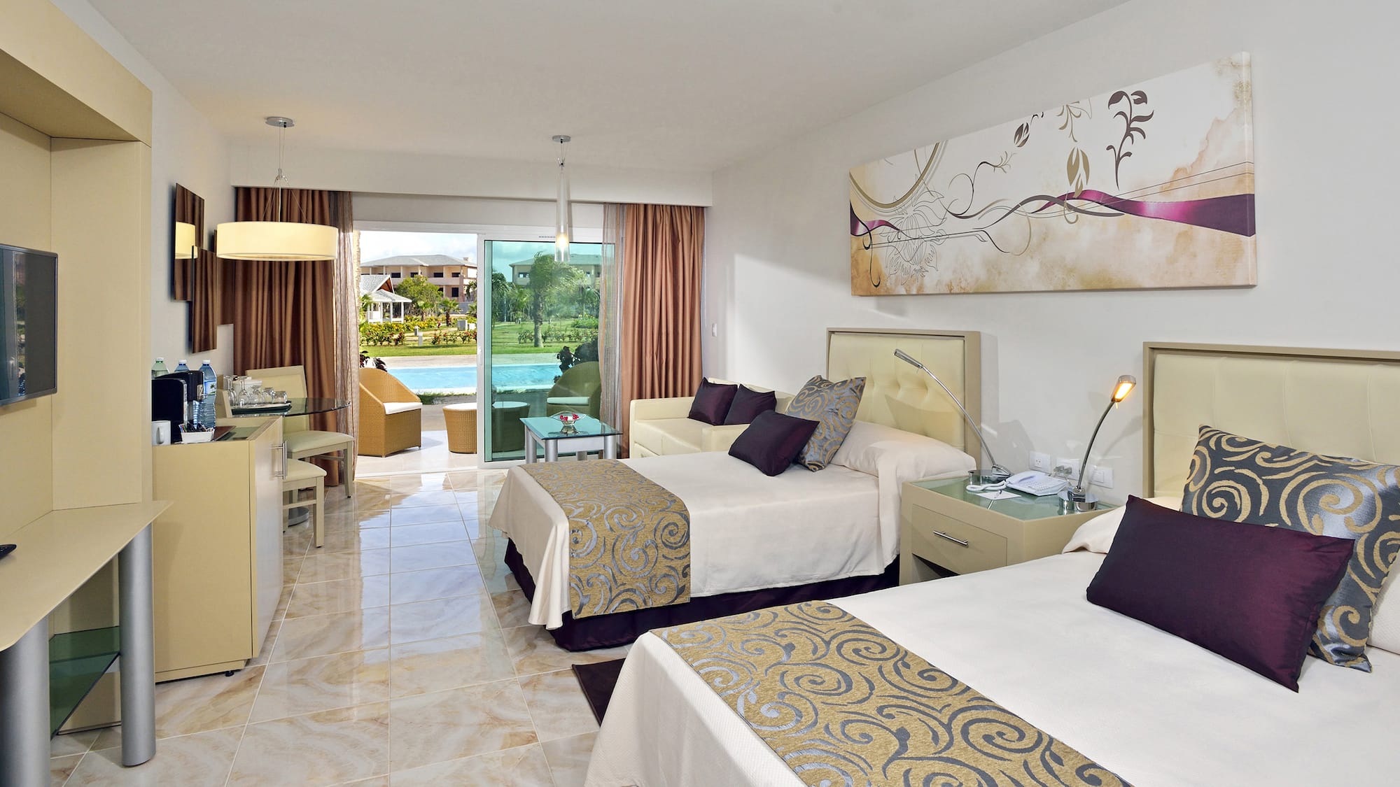 a room with two beds and a pool in the background