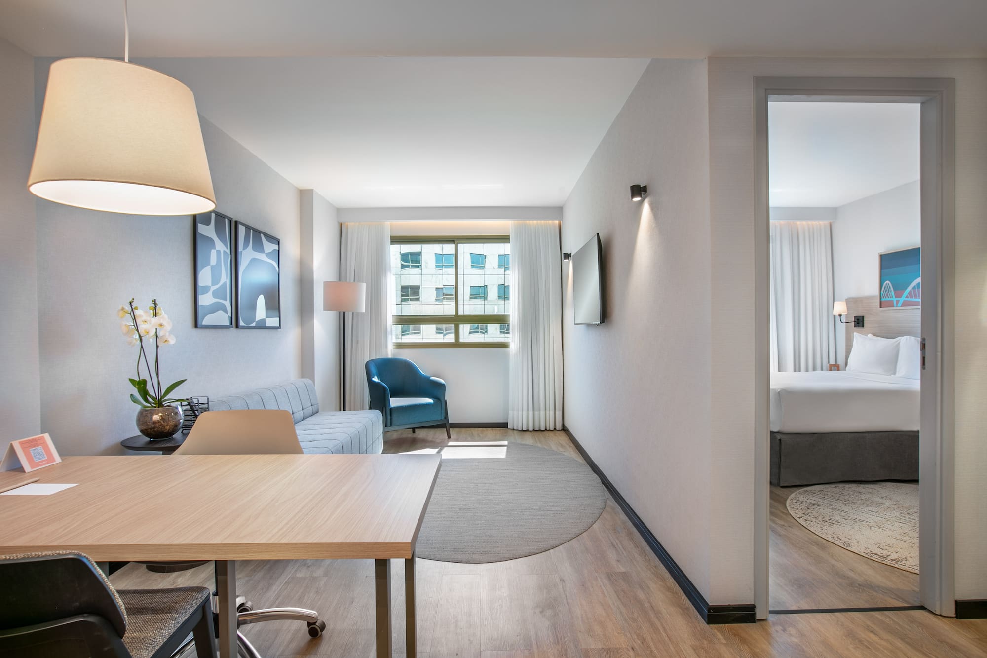 a room with a couch and a tv