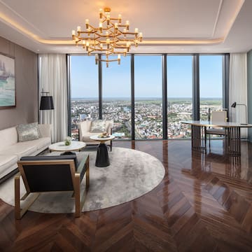 a living room with a view of a city