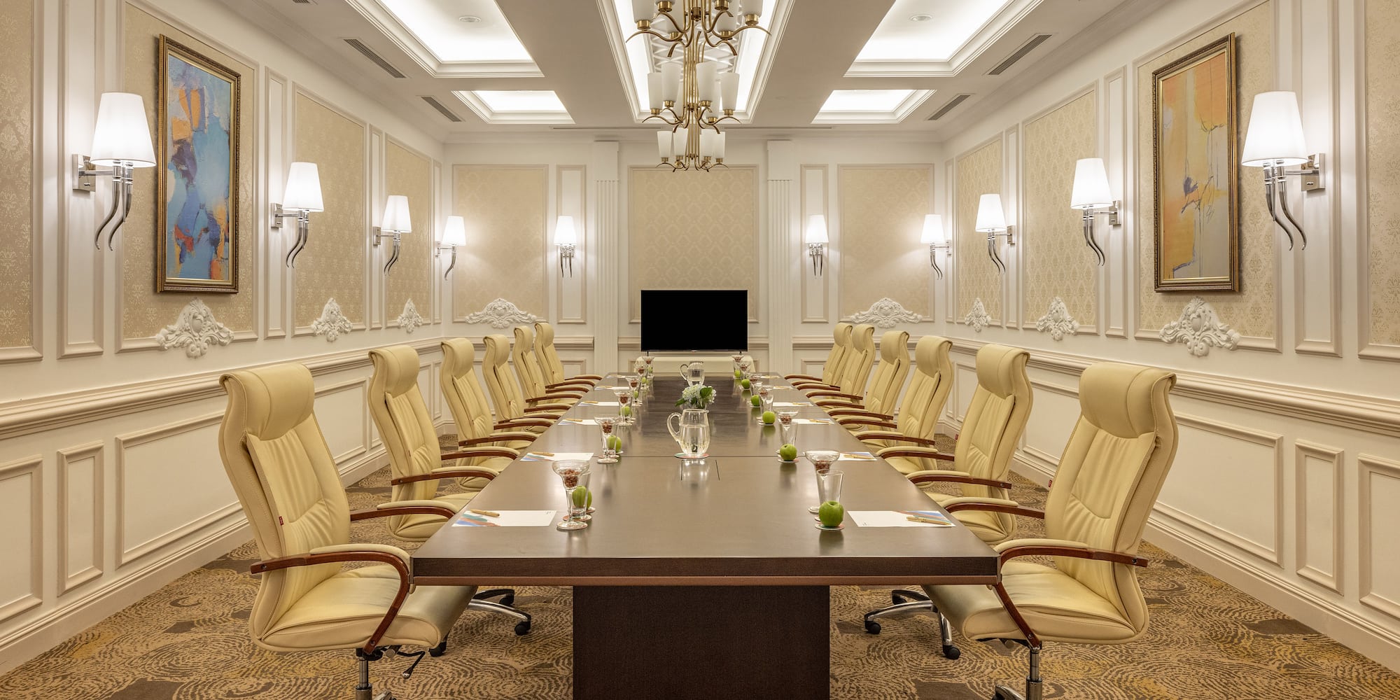 a conference room with a table and chairs