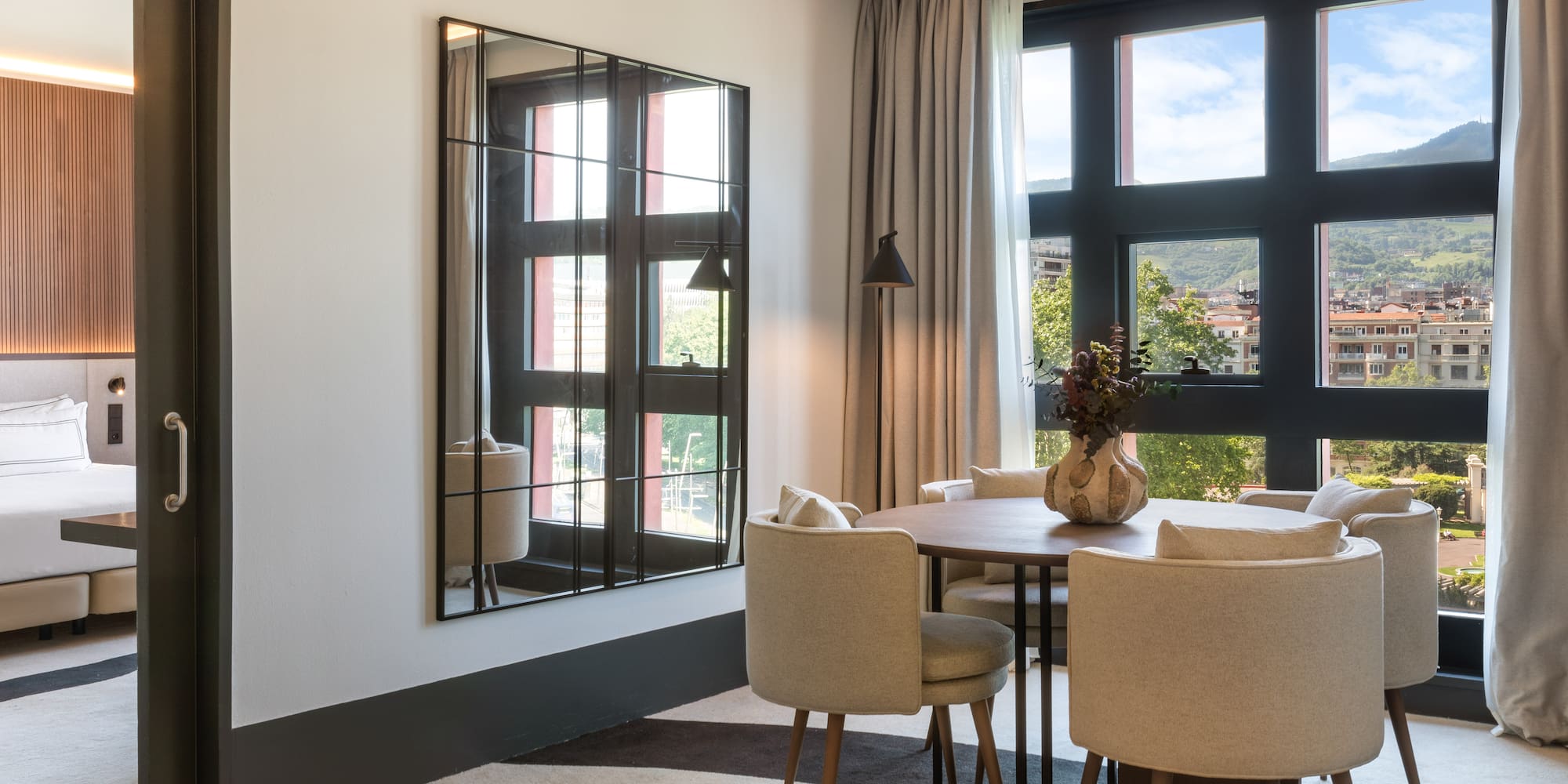 a room with a table and chairs