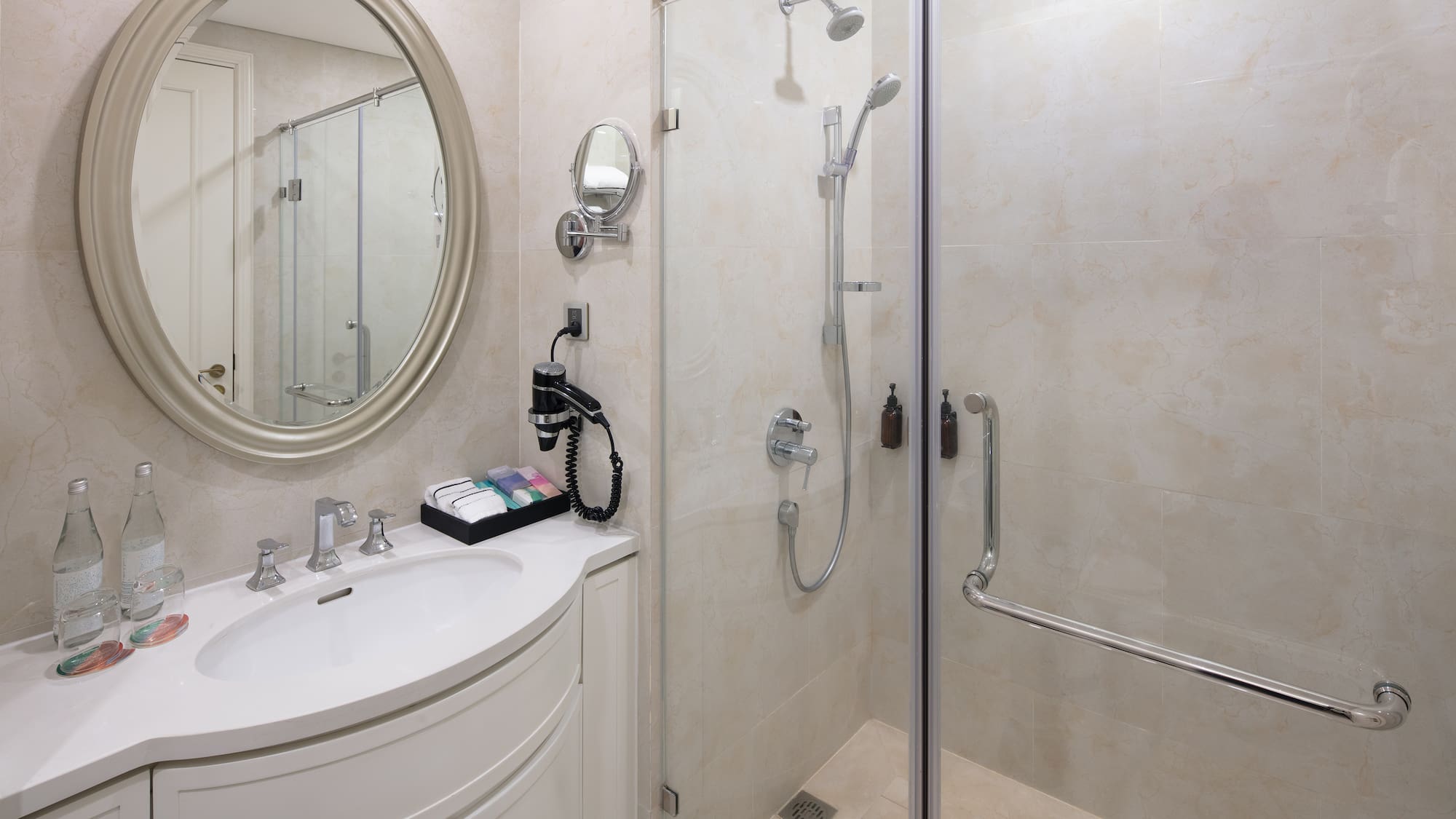 a bathroom with a shower and a sink