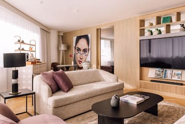 a living room with a couch and a table