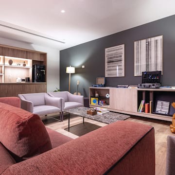 a living room with a couch and a tv