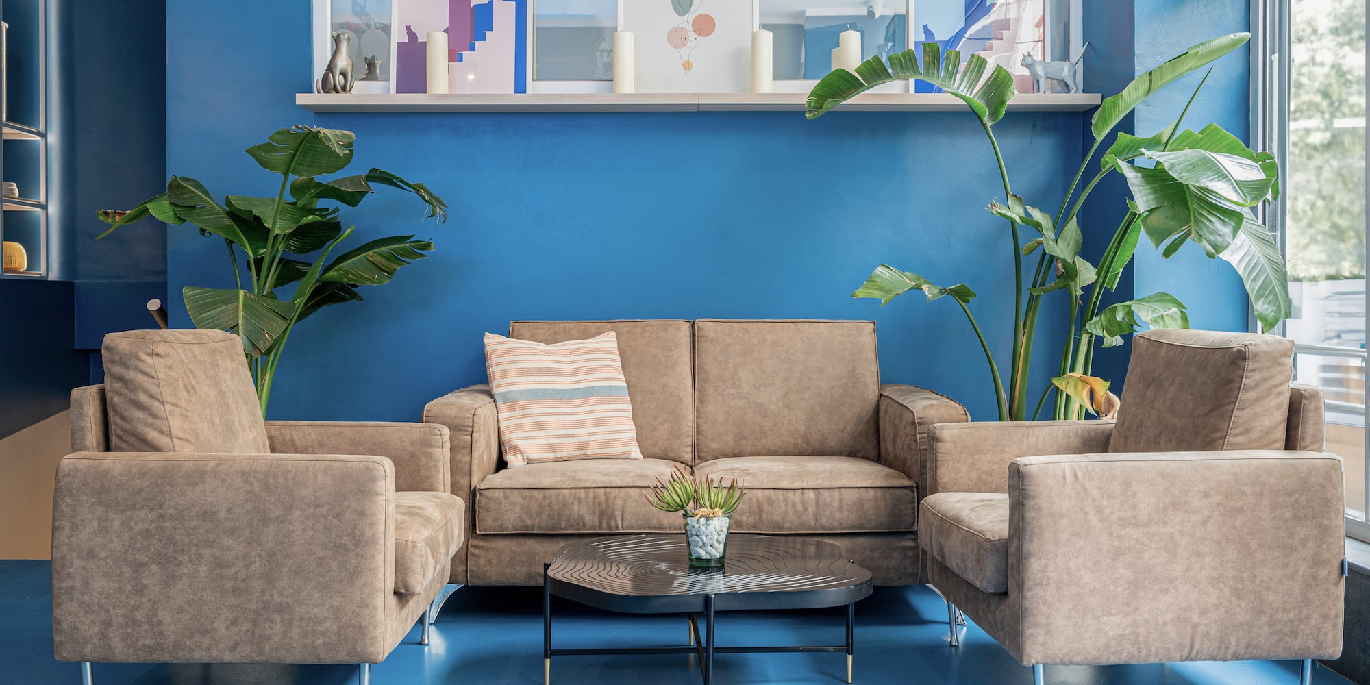 a room with couches and chairs