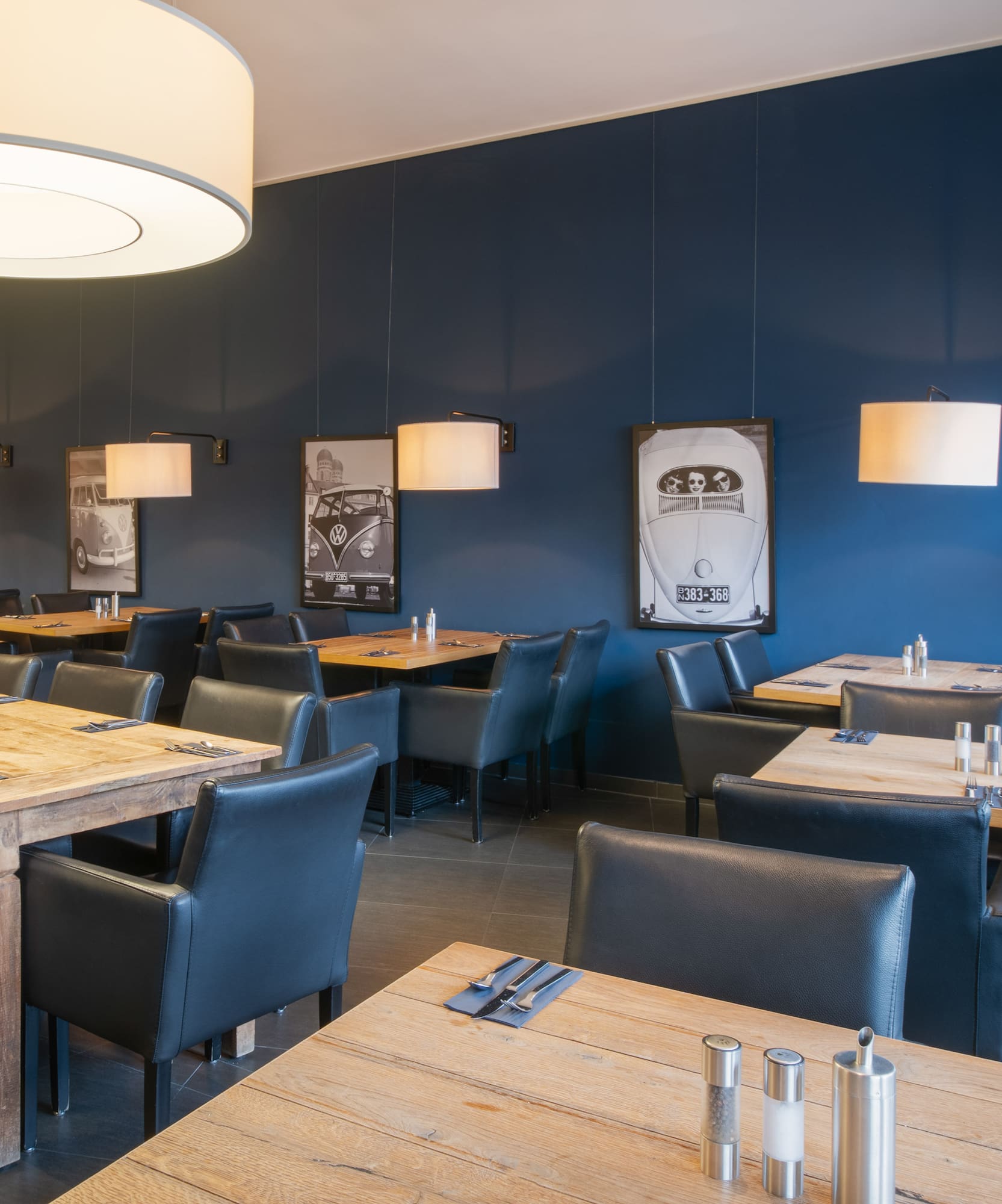 a restaurant with tables and chairs