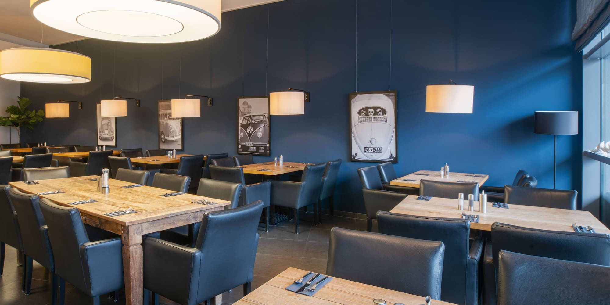 a restaurant with tables and chairs