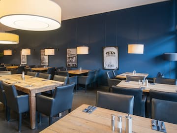 a restaurant with tables and chairs