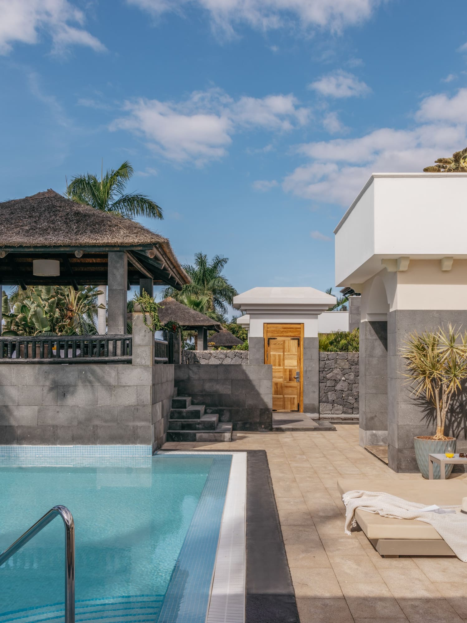 a pool next to a building