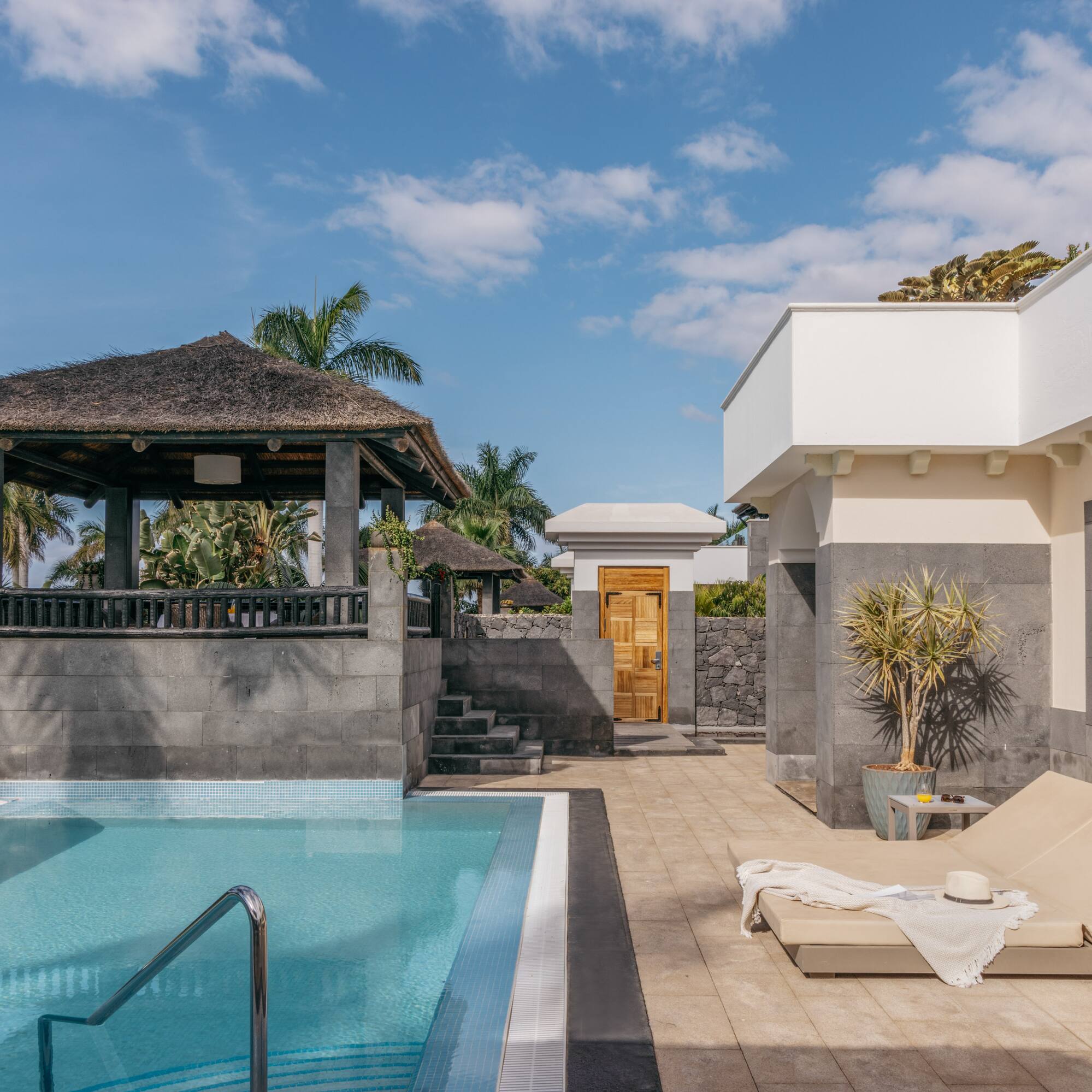 a pool next to a building