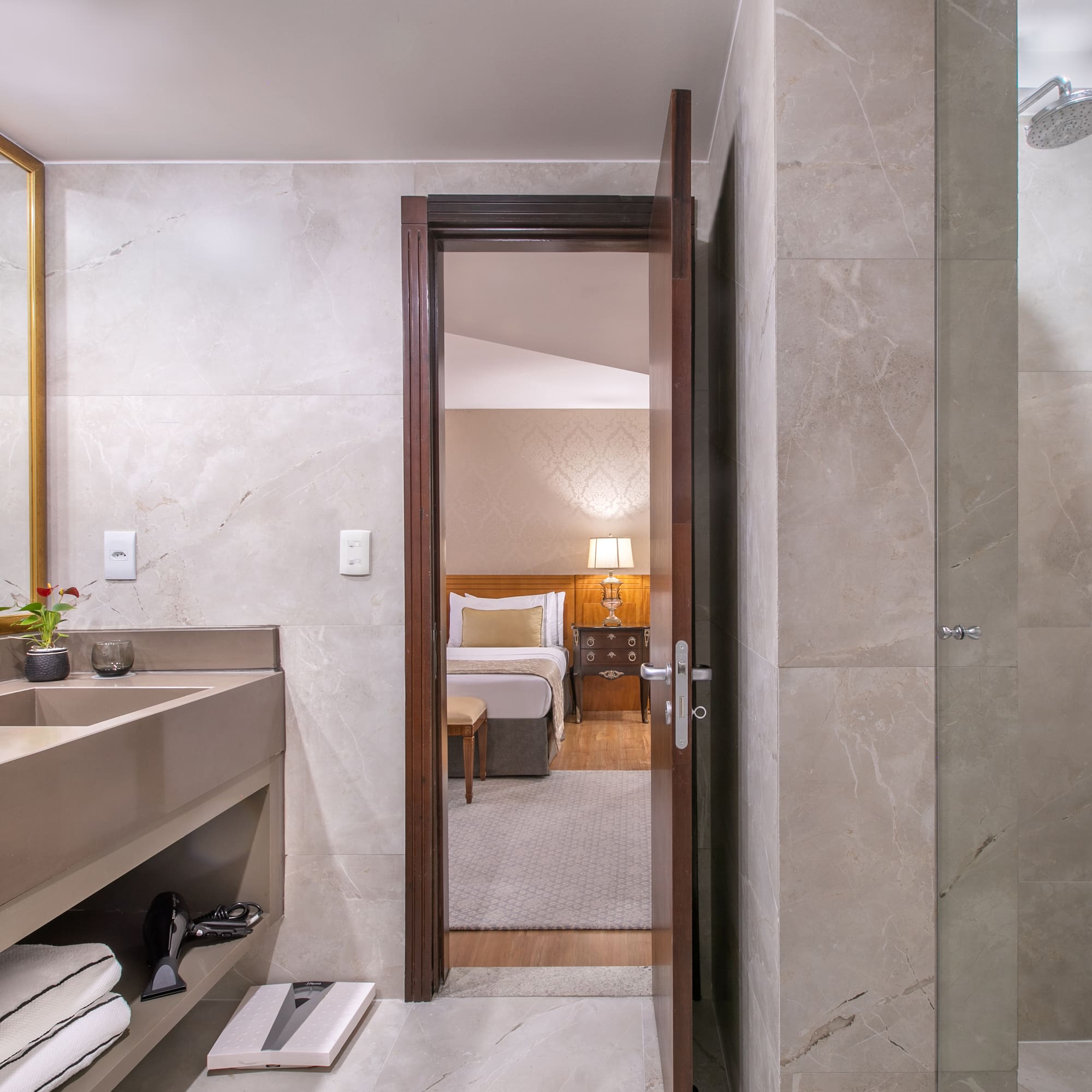 a bathroom with a mirror and sink