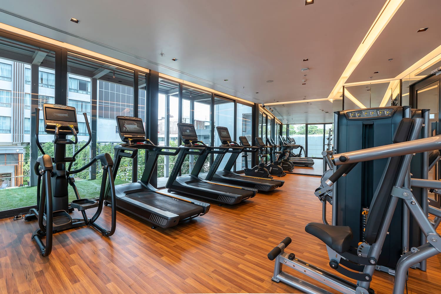 a room with treadmills and exercise machines
