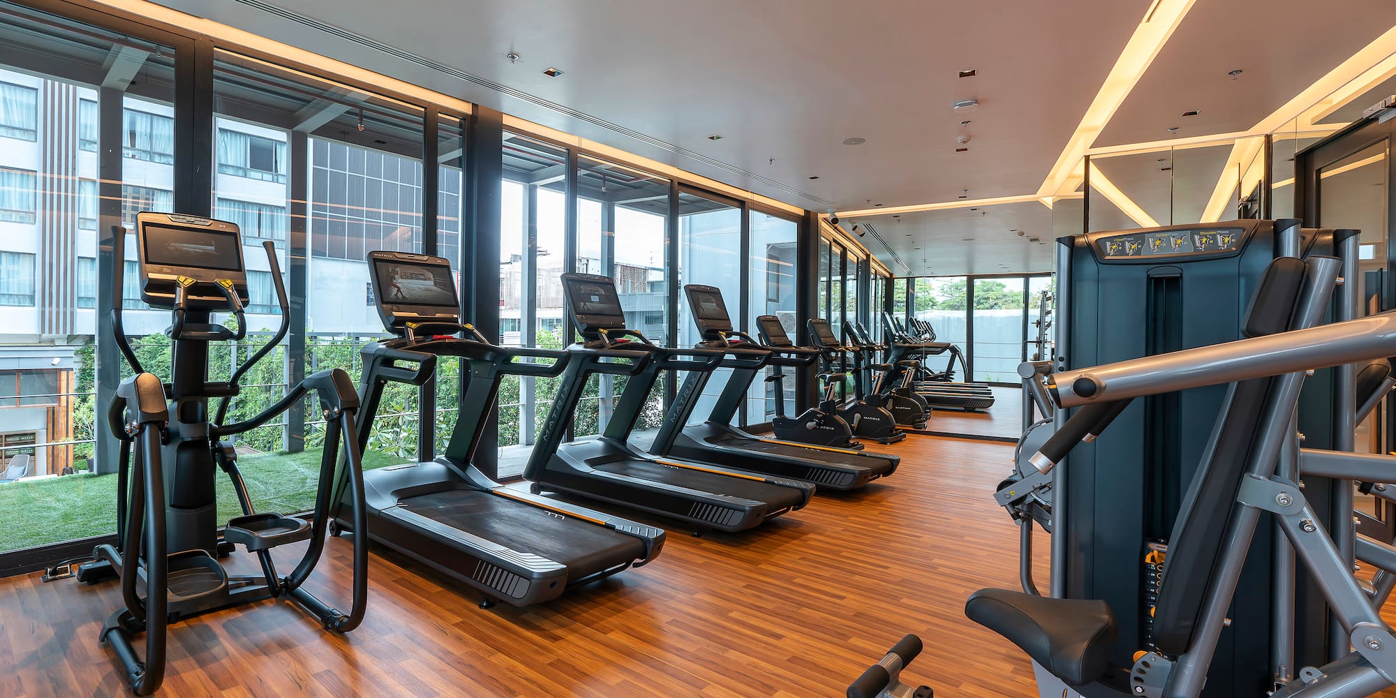 a room with treadmills and exercise machines