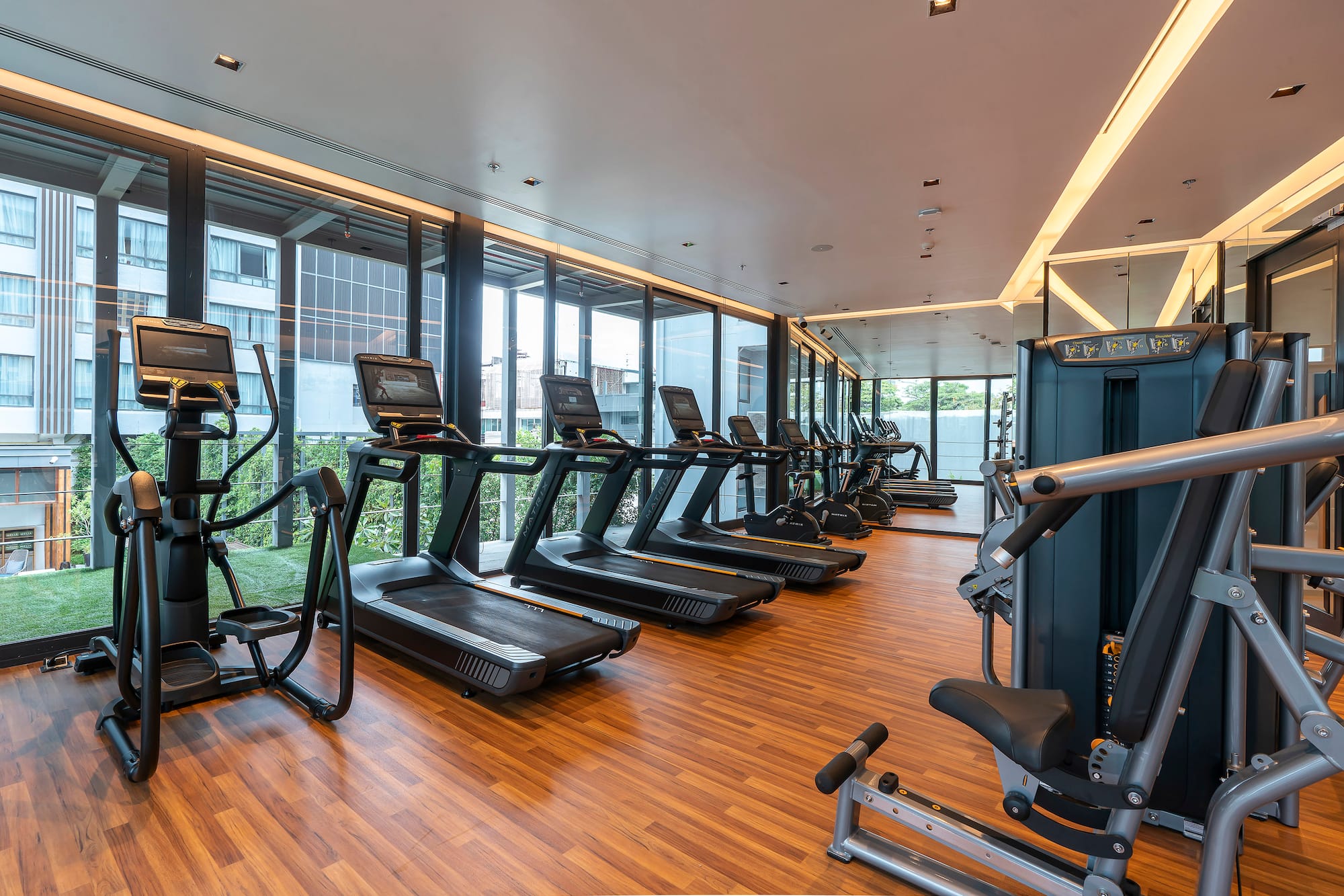 a room with treadmills and exercise machines