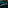 Aerial view of sailboat, yacht, speed boat in turquoise bay, rocky coast.