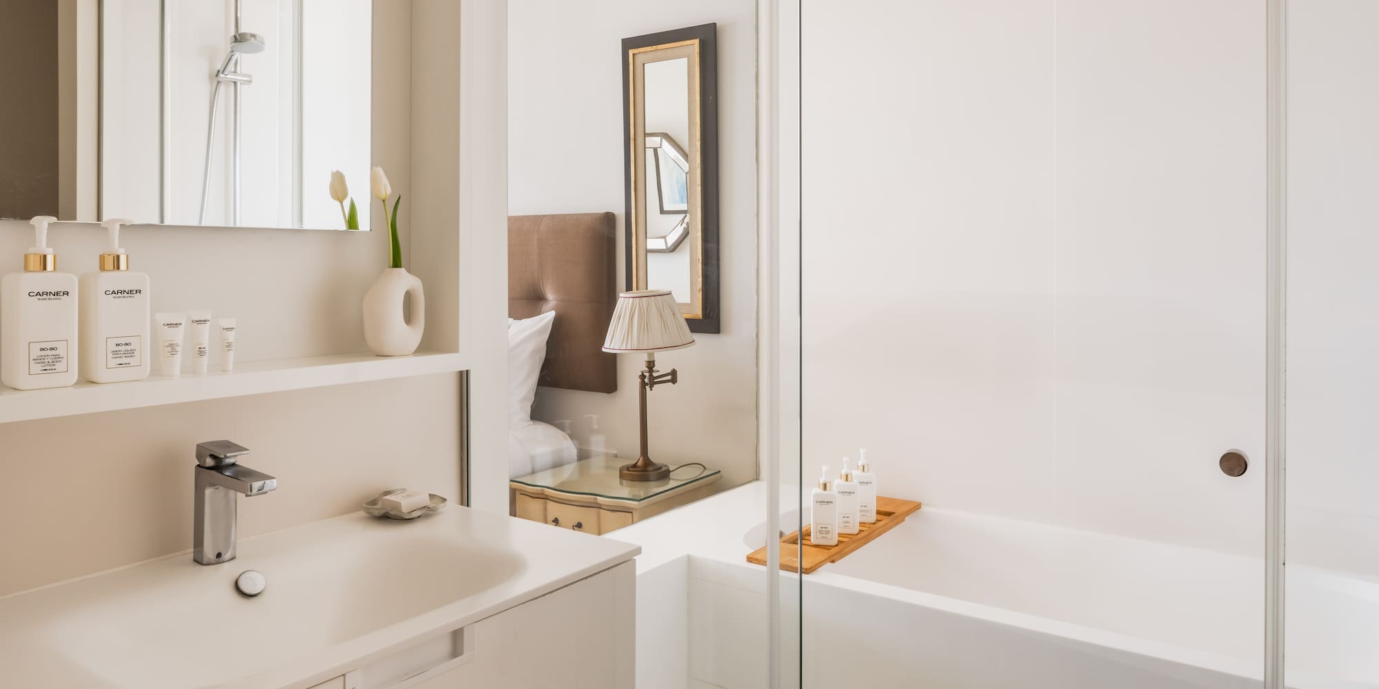 a bathroom with a bathtub and sink