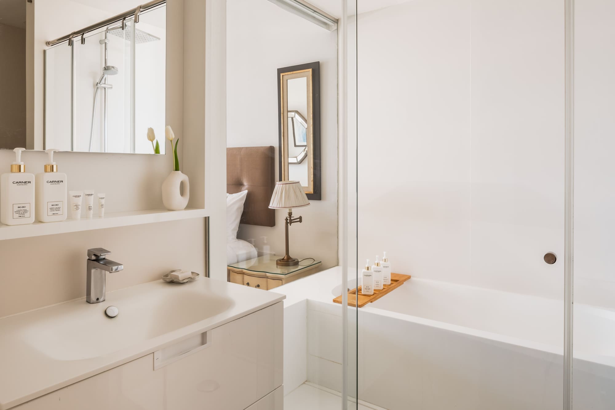 a bathroom with a bathtub and sink