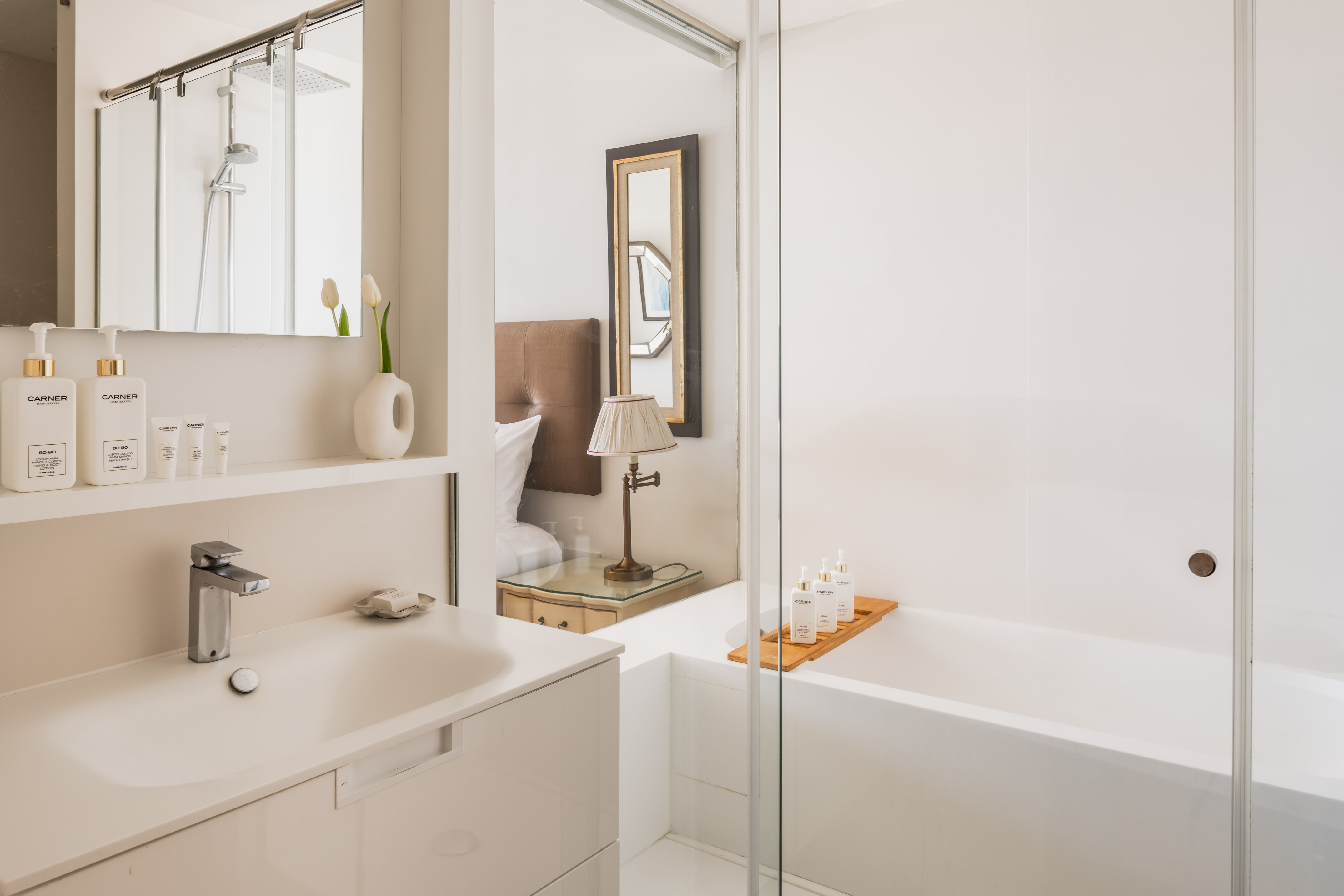 a bathroom with a bathtub and sink