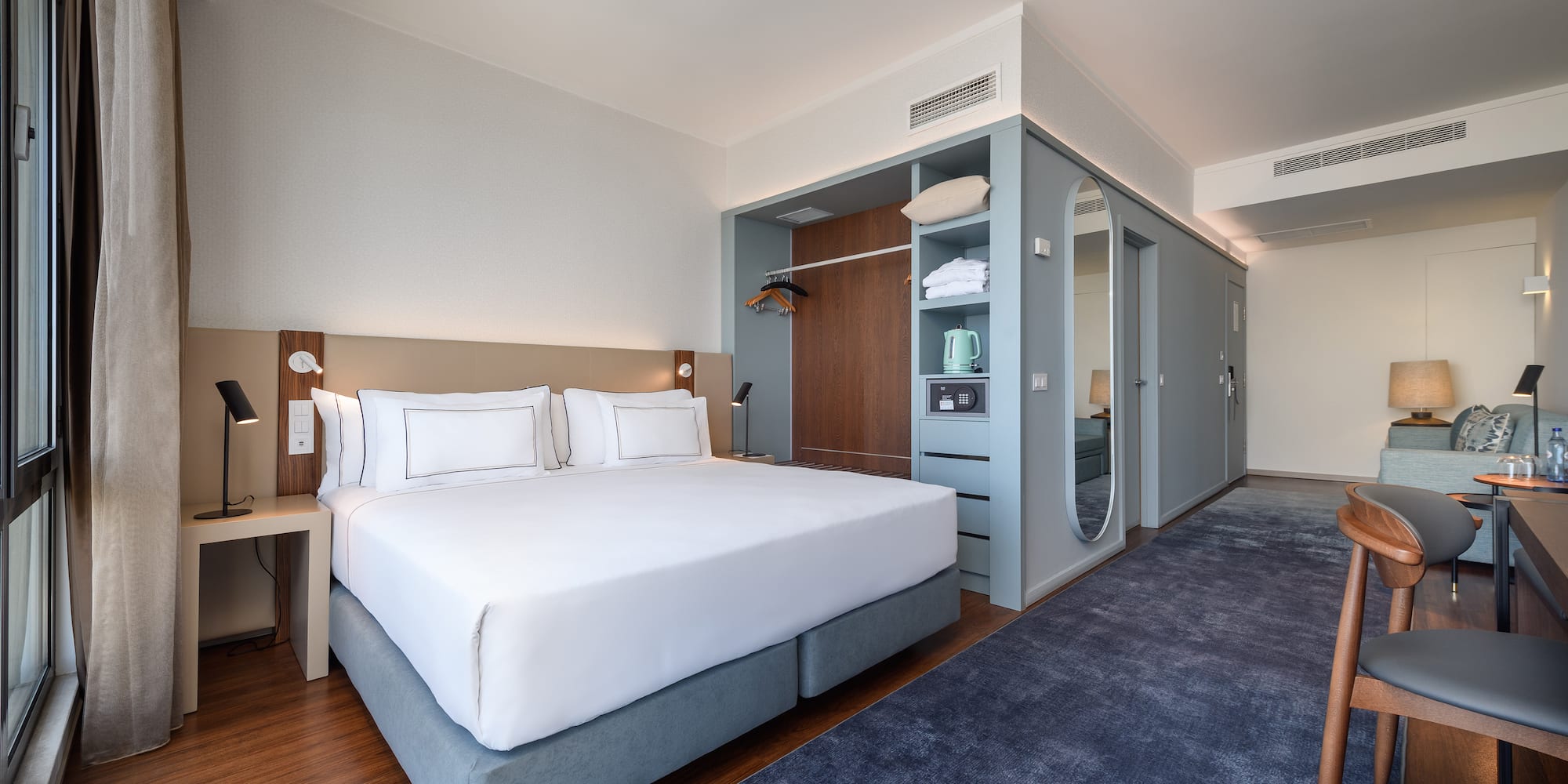 a room with a bed and a closet