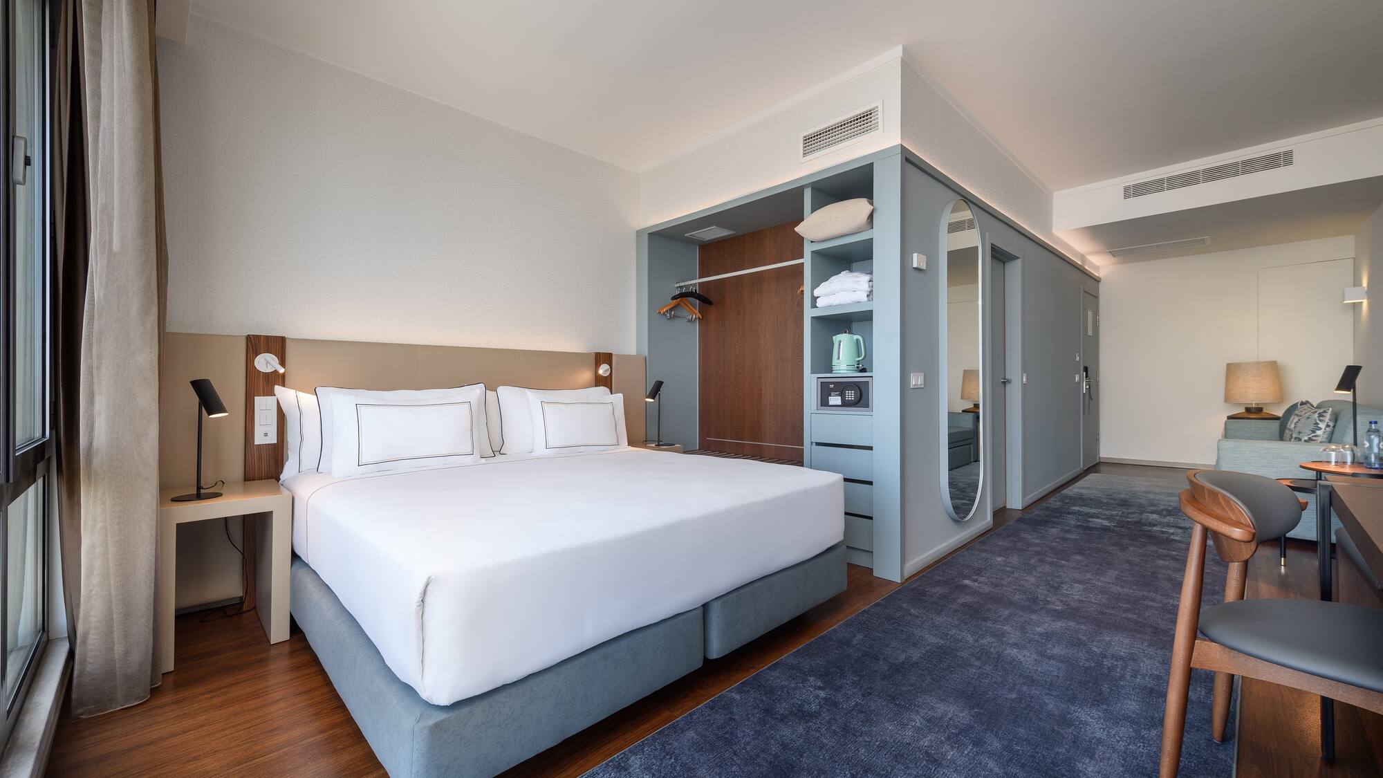 a room with a bed and a closet