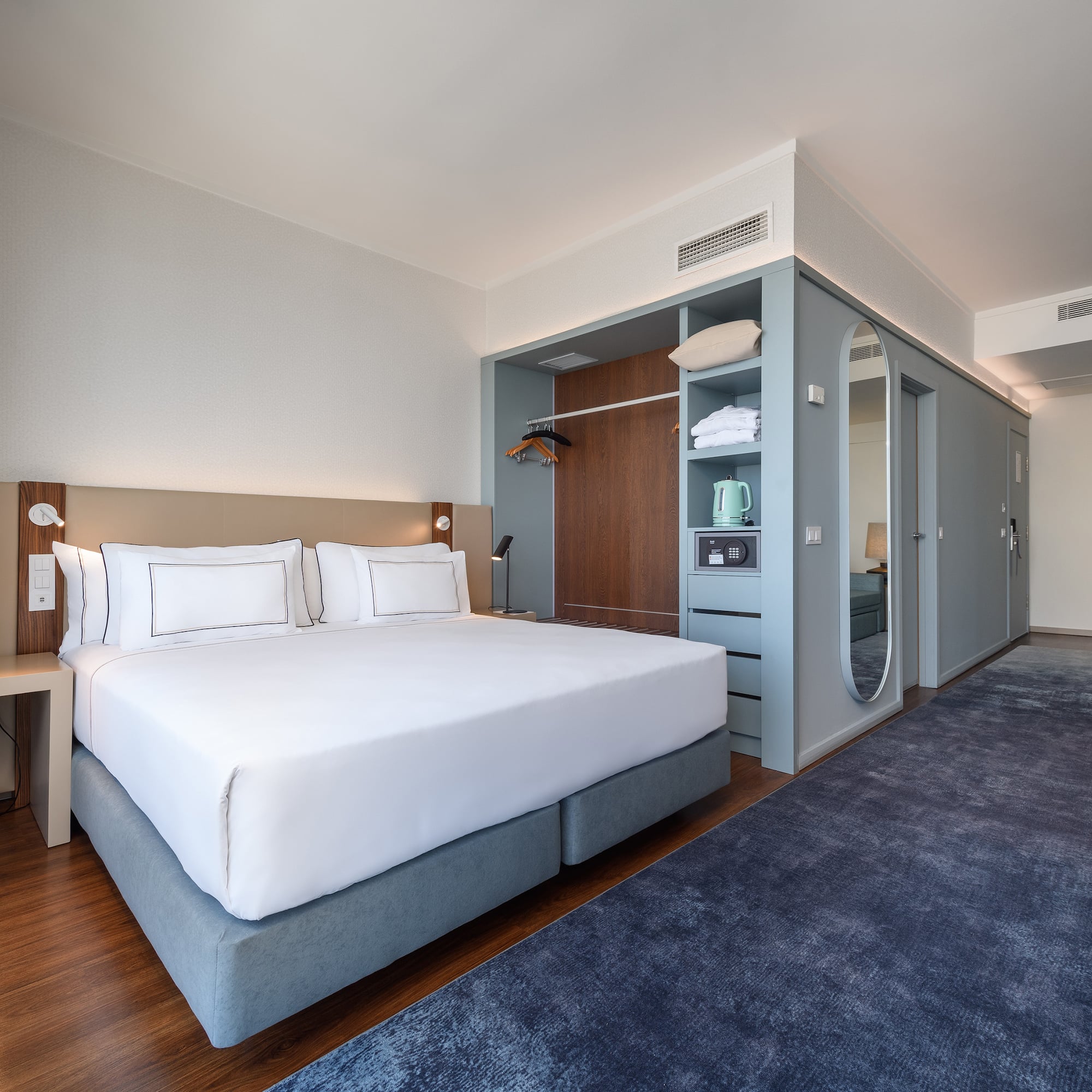 a room with a bed and a closet