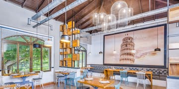 a room with tables and chairs