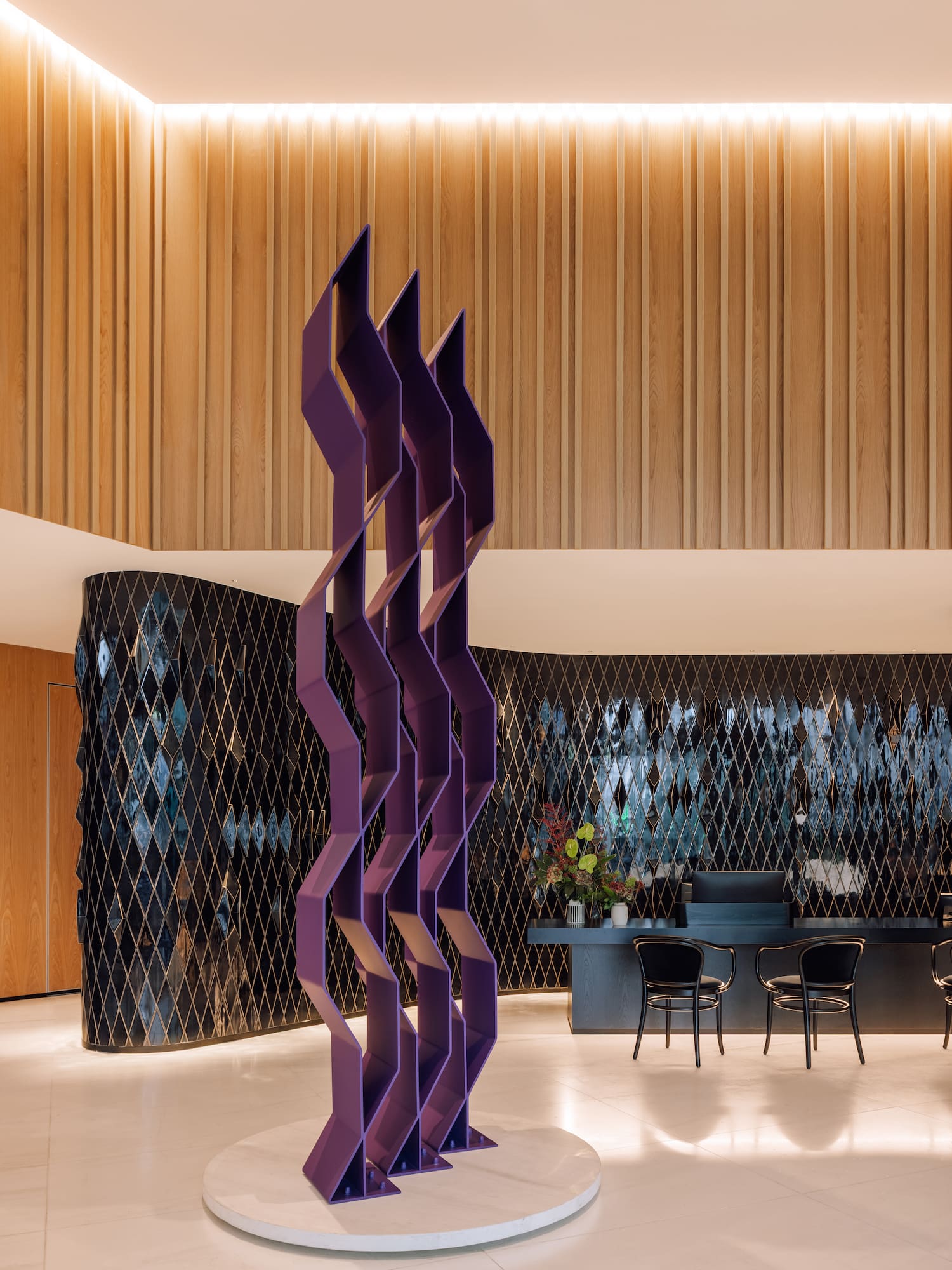 a purple sculpture in a room