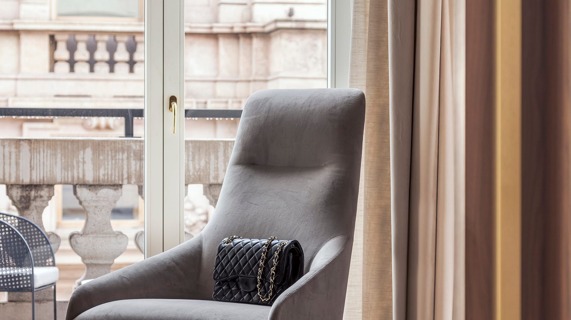 a chair with a purse on it