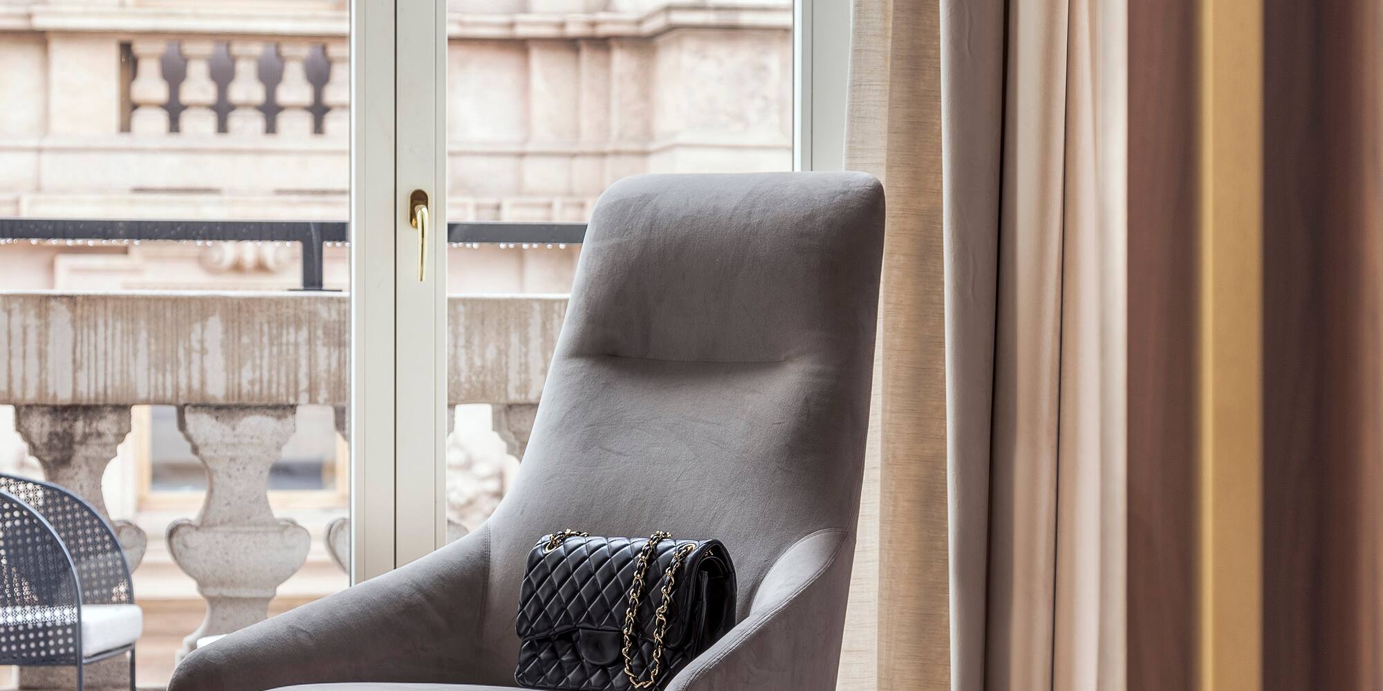 a chair with a purse on it