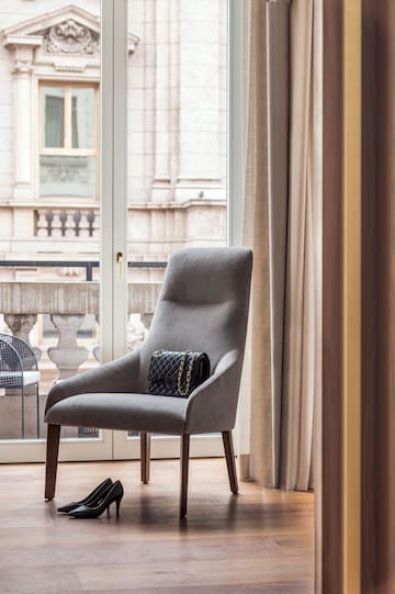 a chair with a purse on it