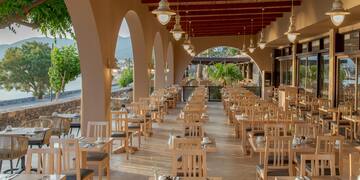 a restaurant with tables and chairs
